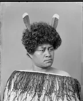 Maori Woman Wearing Korowai and Huia Feathers